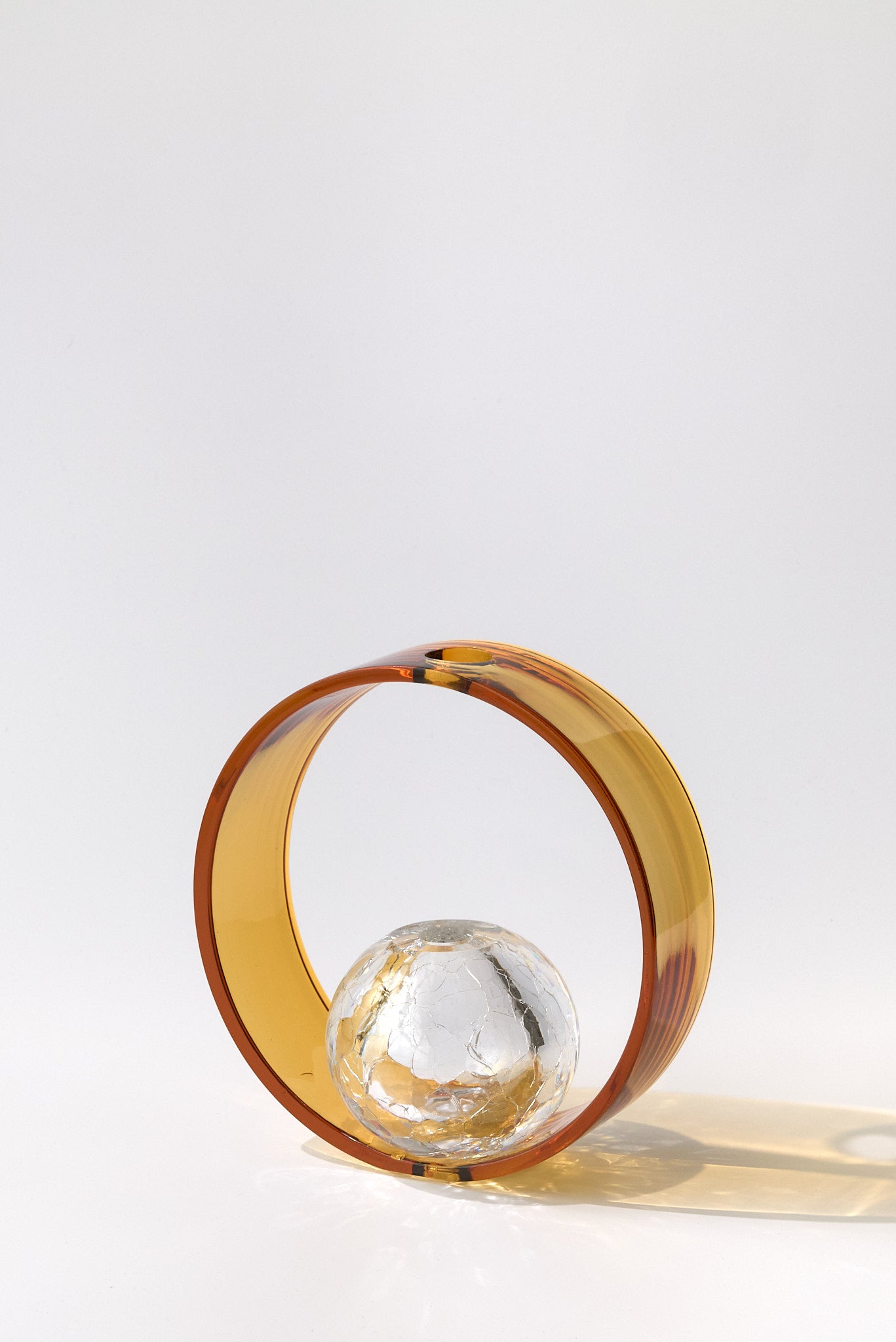 Saturnino — Hand-Blown Crystal Ring and Sphere, Amber